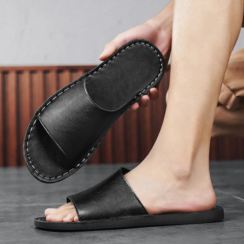 Men's brown leather casual sandals with a textured rubber sole on a neutral background.