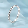 Oxidised black silver 'I Love You' moss code ring on a simple band for women.