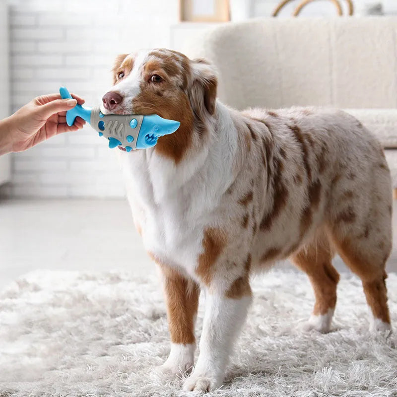 Blue textured dog chew toy shaped with ridges mimicking shark teeth for dental cleaning