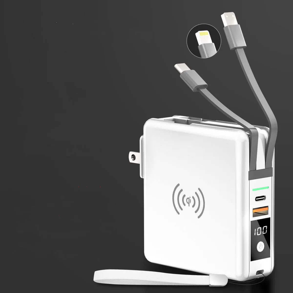 Black Super QI 10000mAh power bank with wireless charging top and foldable UK plug adapter attached.