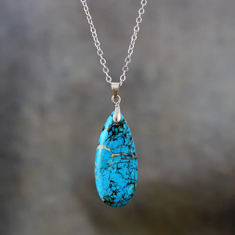 Emperor Stone jade water drop pendant necklace on an 18K gold plated chain, showing heart-shaped and constellation design options.