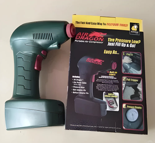 Black portable car tyre inflator with digital display and LED light on a coiled power cable.