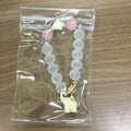 Crystal elephant charm bracelet with clear beads and gold finish metal charm