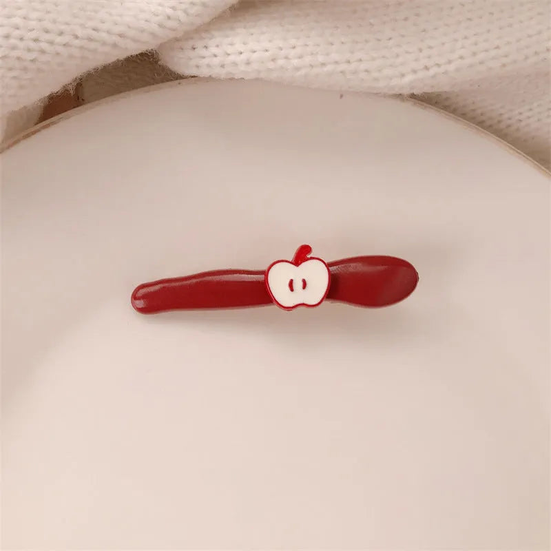 Red stereo love heart-shaped hairpin with French retro dots and willow leaf design