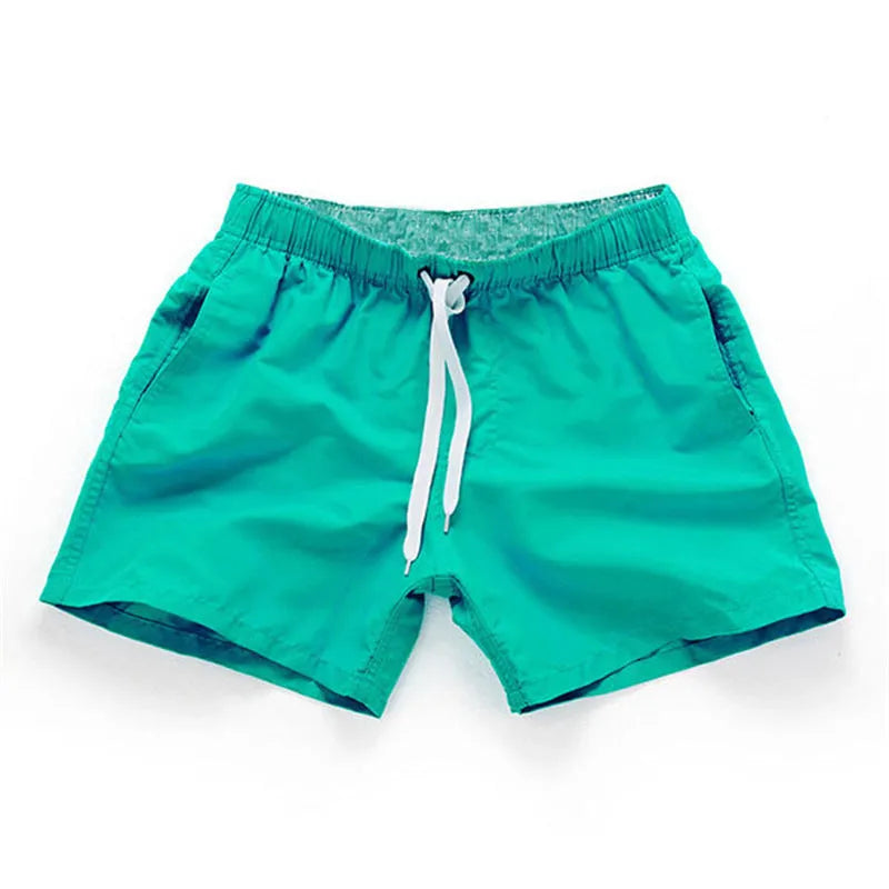 Men's straight leg polyester beach shorts in multiple colours with extended sizing options