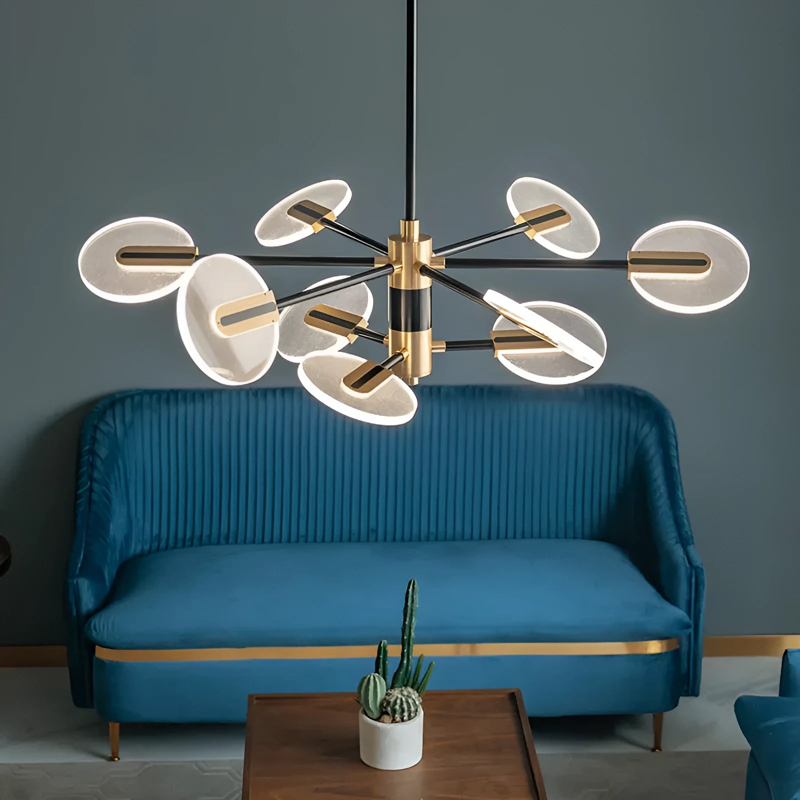 Nordic style iron frame LED chandelier with multiple acrylic shades, shown in a dining room setting.