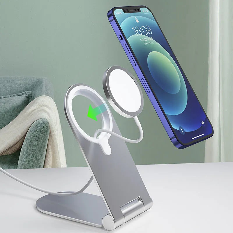 Silver adjustable magnetic phone bracket for iPhone 12 shown in a compact, portable design.
