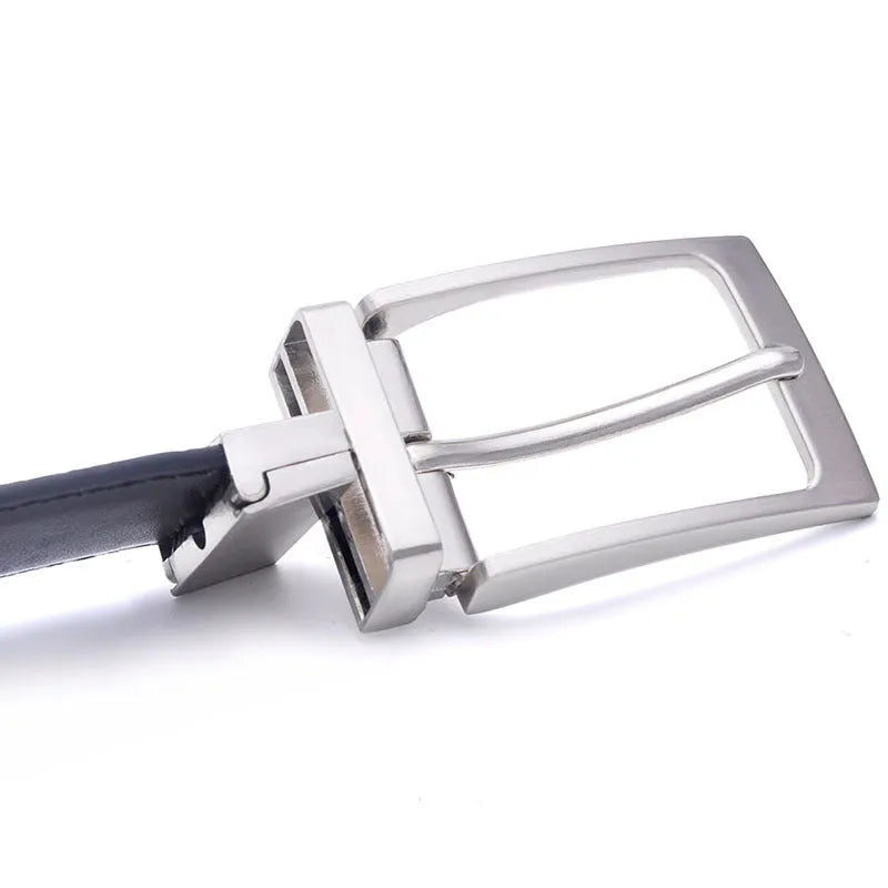 Men's brown and black genuine leather belt with a silver rotating pin buckle on a dark background.