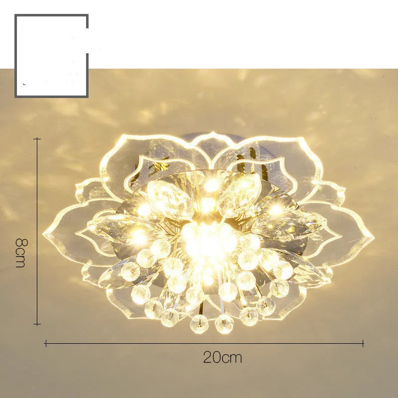Modern crystal ceiling lamp with flower-shaped shade and LED light in warm white, white, or colour options.