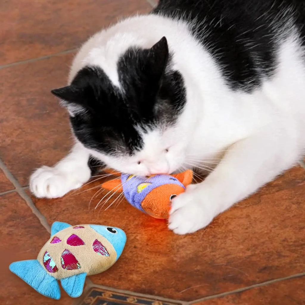 Two goldfish-shaped cat toys in blue, orange, and pink colours with soft plush exterior