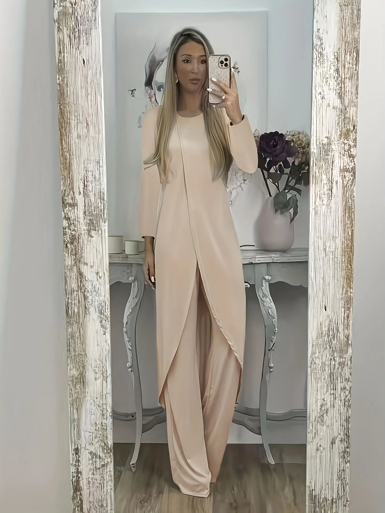 Women's casual two-piece lounge set showing long sleeve top and trousers in loose fit