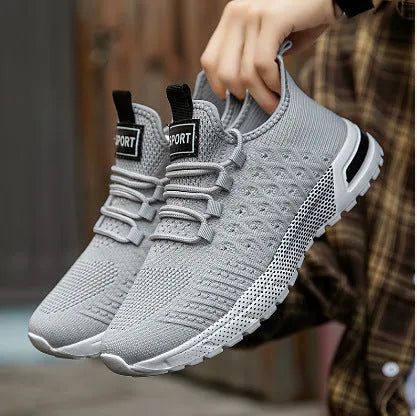Men's solid colour casual shoes with a mesh upper, shown in multiple available colours.
