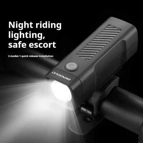 A black USB rechargeable bicycle headlight mounted on handlebars with a quick-release strap.