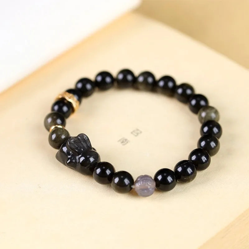 Handmade national style bracelet with a lying rabbit Jin Yaoshi charm and gray agate beads.