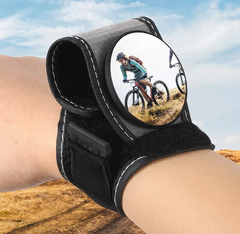 Black nylon bicycle rear-view mirror mounted on handlebars