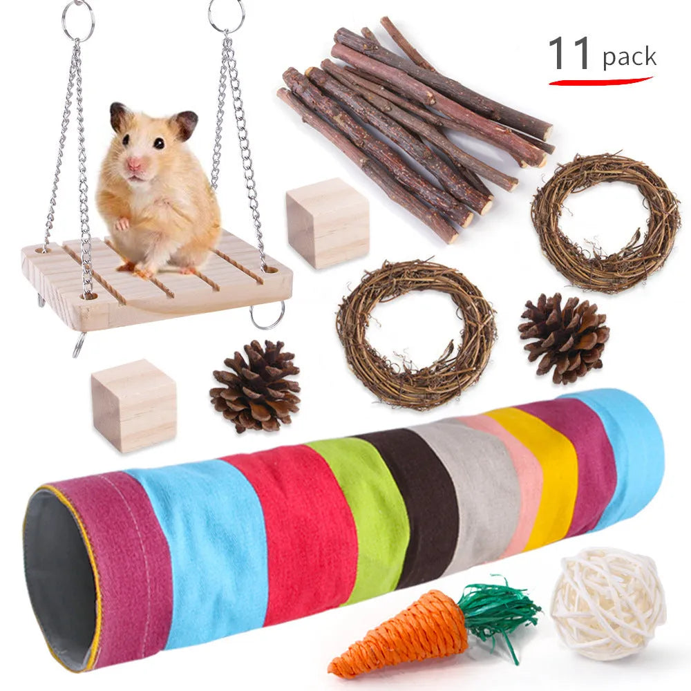 Assortment of natural wooden and woven grass chew toys for small pets like rabbits and guinea pigs