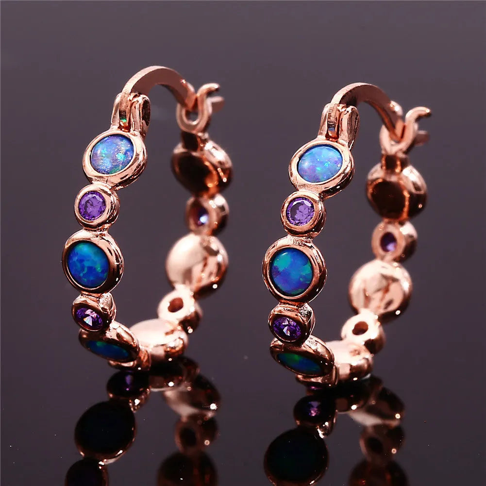 Round synthetic opal and cubic zirconia clip-on earrings in electroplated copper