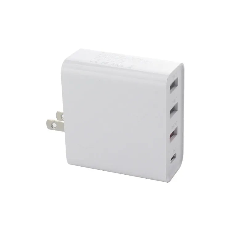 Black 48W four-port USB-C wall charger with UK plug on a white background.