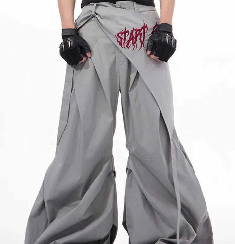 Boy modelling black wide-leg summer pants in a refined Korean style