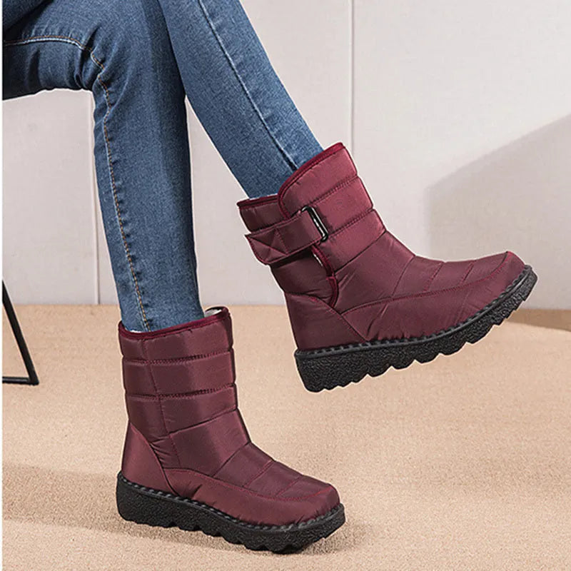 Women's waterproof snow boots with canvas upper, PU sole, buckle closure, and belt decoration