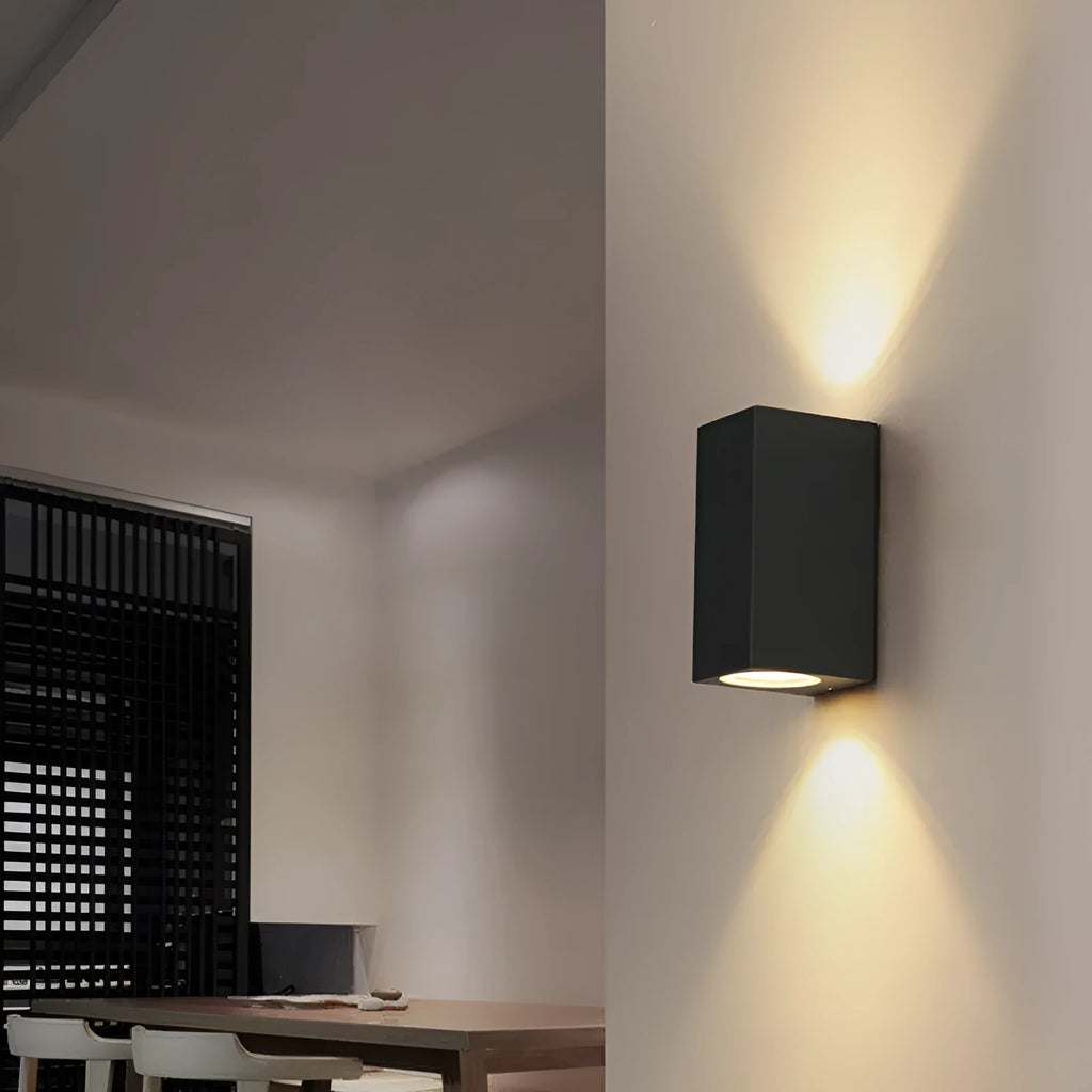 Black aluminium and glass wall-mounted LED lamp with choice of 10W or 12W power.