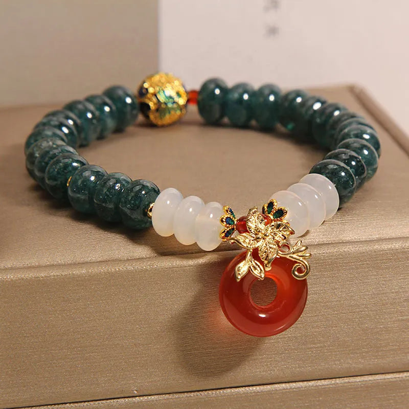 Blue water jade abacus bead bracelet with red agate peace buckle and crystal rhinestone elements