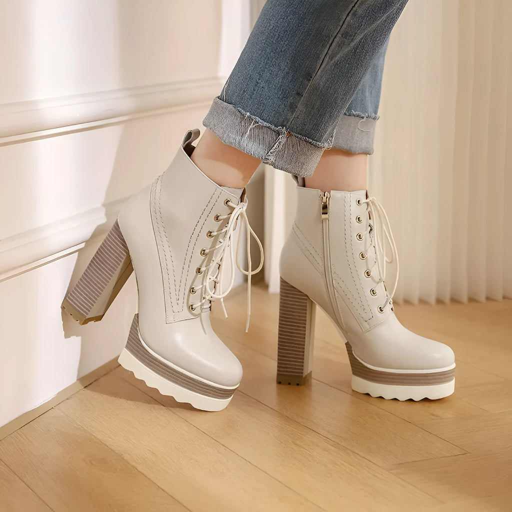 Women's black waterproof platform boots with chunky heels and side zipper