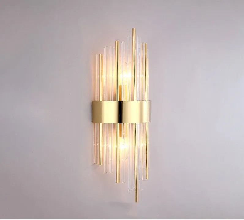 Modern crystal wall lamp with petal design and titanium gold finish mounted on wall