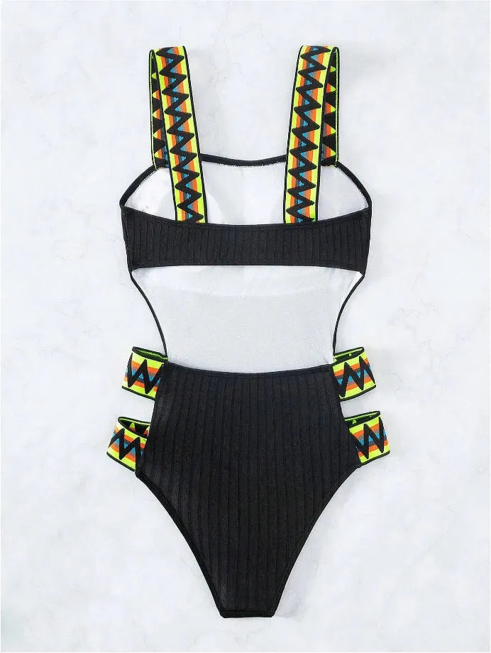 Women's solid black one-piece swimsuit with a classic style on a mannequin.