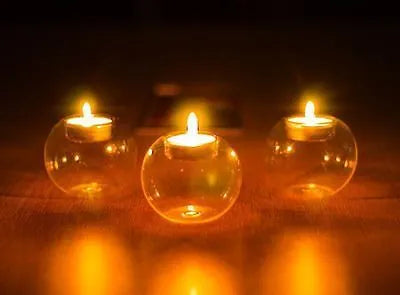 Handmade round hollow glass candle holder with clear glass construction