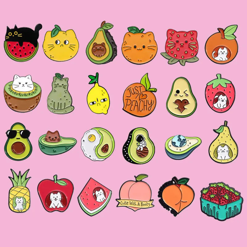 Colourful cartoon fruit design metal brooch with a silver pin fastener on the back.