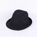 Classic brown fedora hat with structured crown and wide brim on a wooden stand