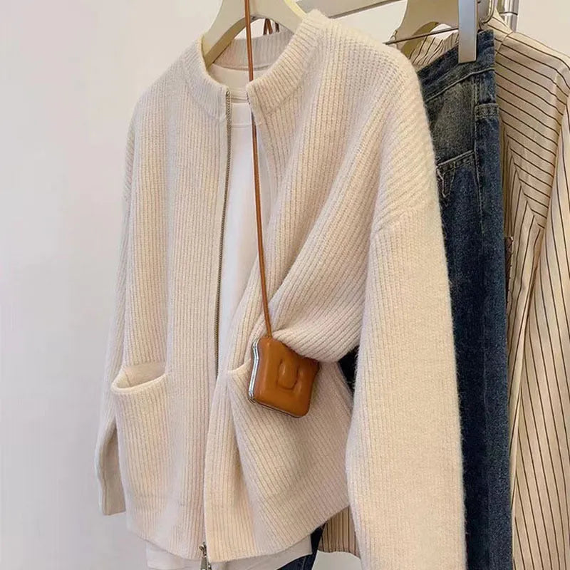 Beige women's cardigan-style sweater coat with long sleeves made from soft viscose.