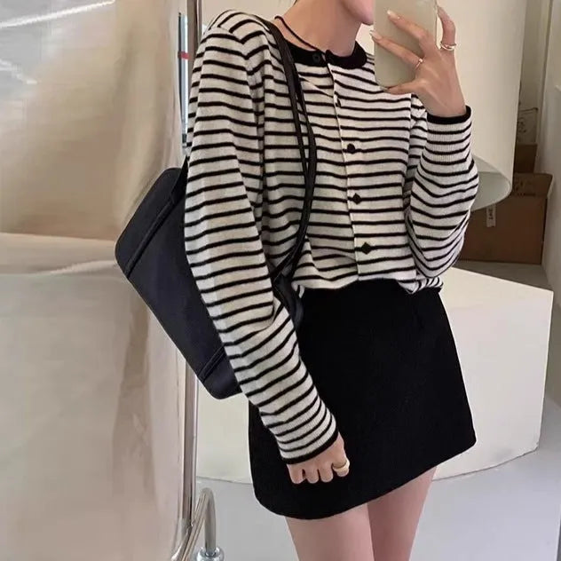 Dark grey and white striped women's cardigan coat with long sleeves and a slim fit.