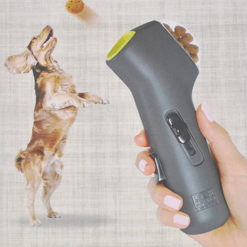 Grey pet snack launcher toy measuring 18cm with spring trigger for dog and cat training