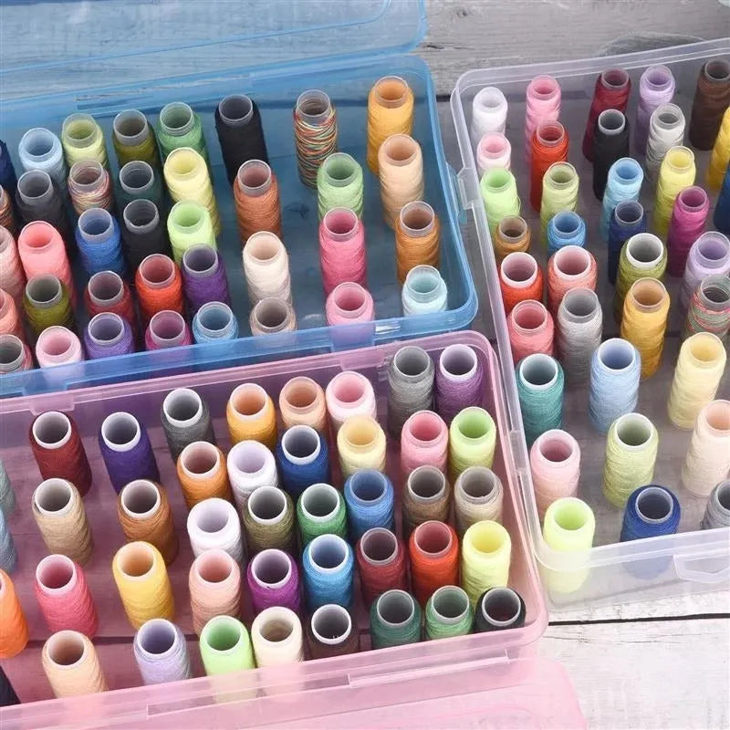 Plastic storage box with 42 compartments for organising embroidery threads and sewing kit items.