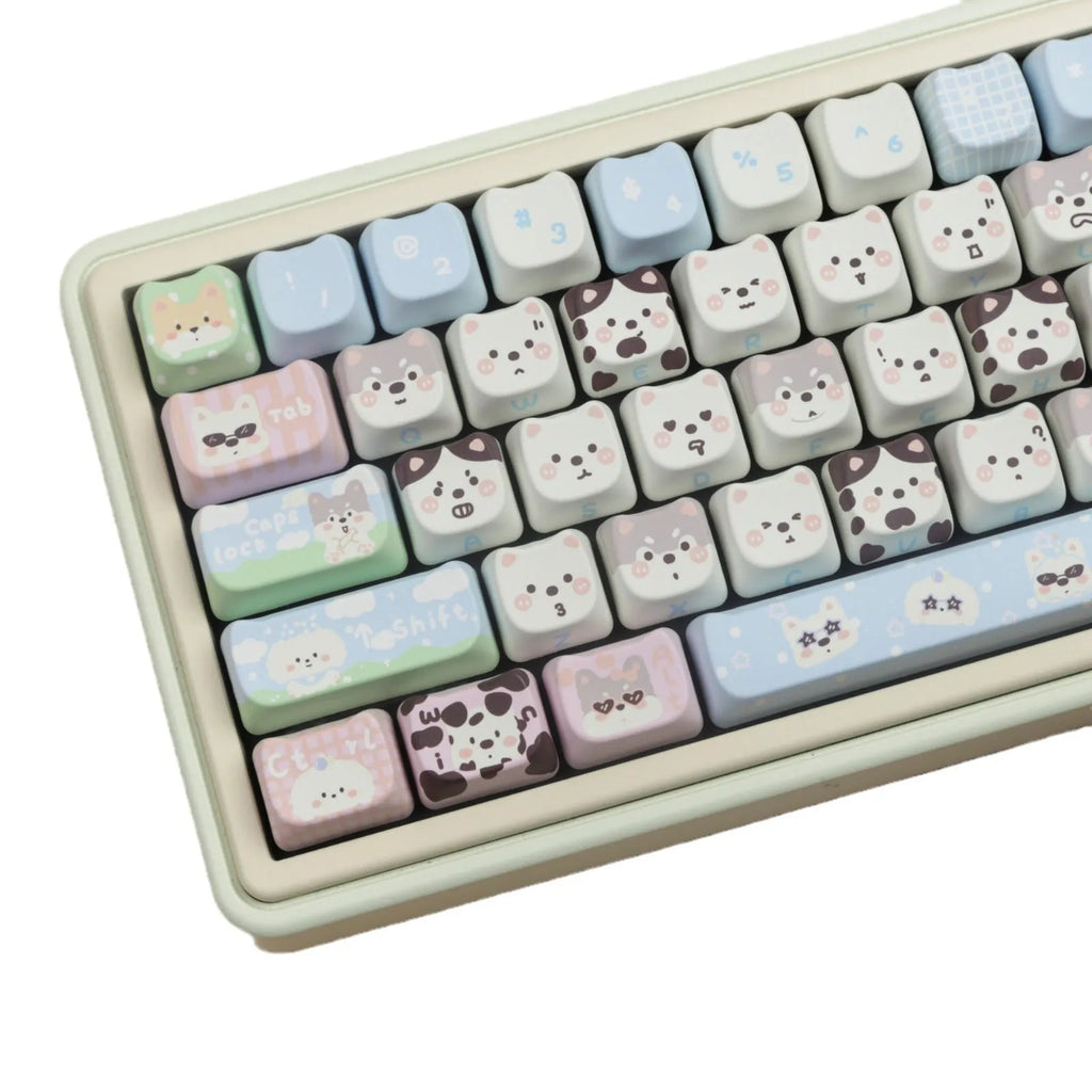 Full set of colourful anime puppy design PBT keycaps for a mechanical keyboard on a white background.