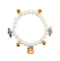 Halloween pet collar with simulated pearls and a purple ghost pumpkin charm around a cat's neck.
