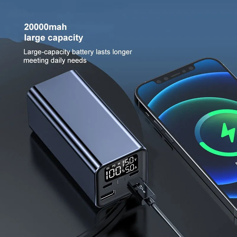 Black metal 65W laptop power bank with 20000mAh capacity showing size next to a laptop.