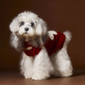 Wool sleeveless dog sweater vest in beige with ear cutouts for small breeds on a white background