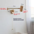 Retro-style long-arm wall spotlight with rotating head in walnut finish and a ribbon pull switch.