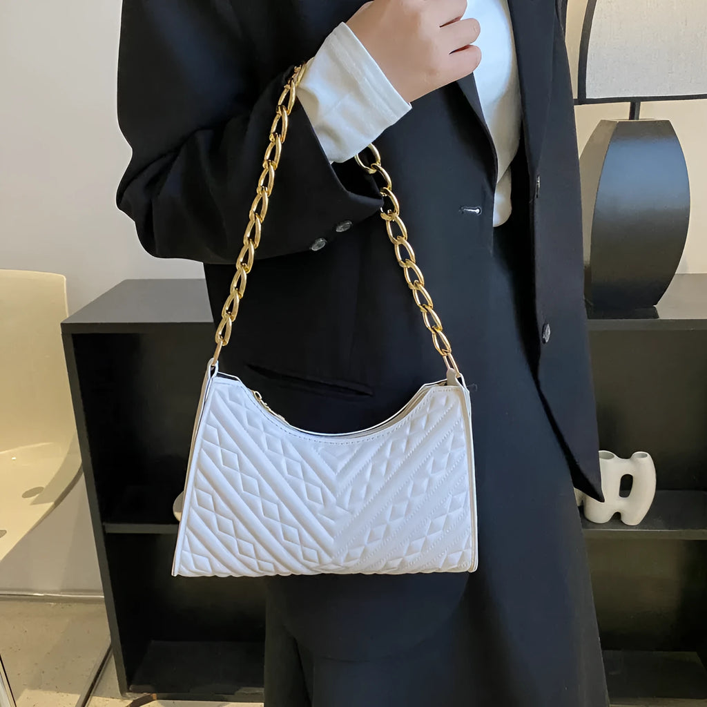 Brown pleated PU chain baguette shoulder bag showing square shape and soft handles.