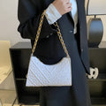 Brown pleated PU chain baguette shoulder bag showing square shape and soft handles.
