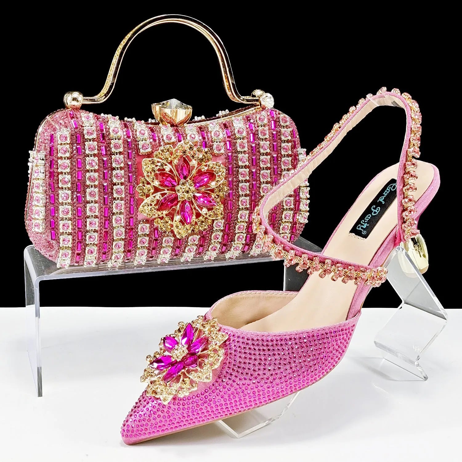 Sexy women's high heel shoes and matching hard clutch bag with floral ankle chain and rhinestone buckle