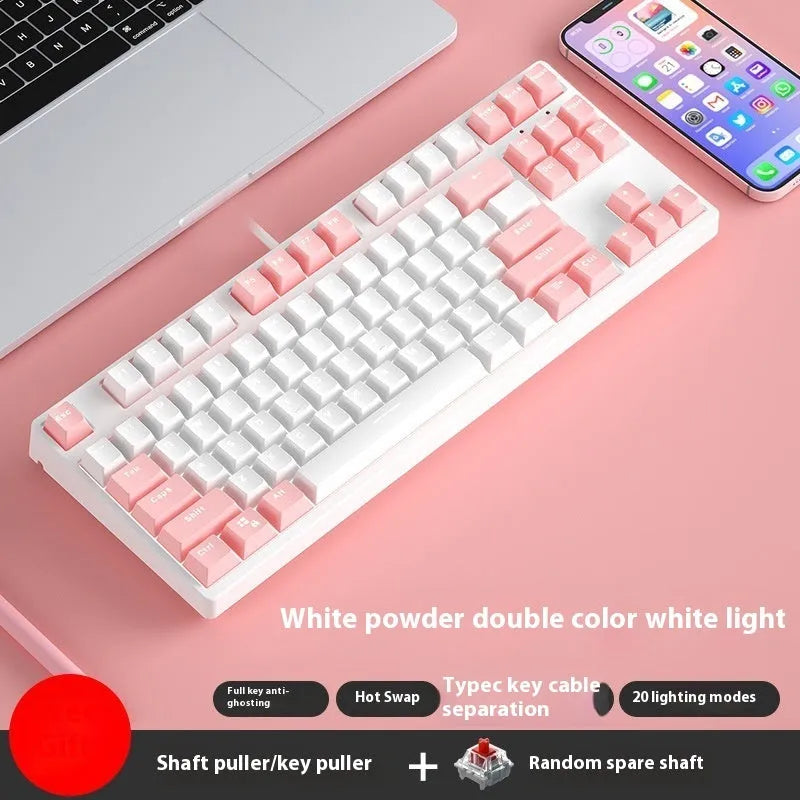 87-key wired mechanical keyboard with two-tone keycaps, shown with switch puller and cleaning brush