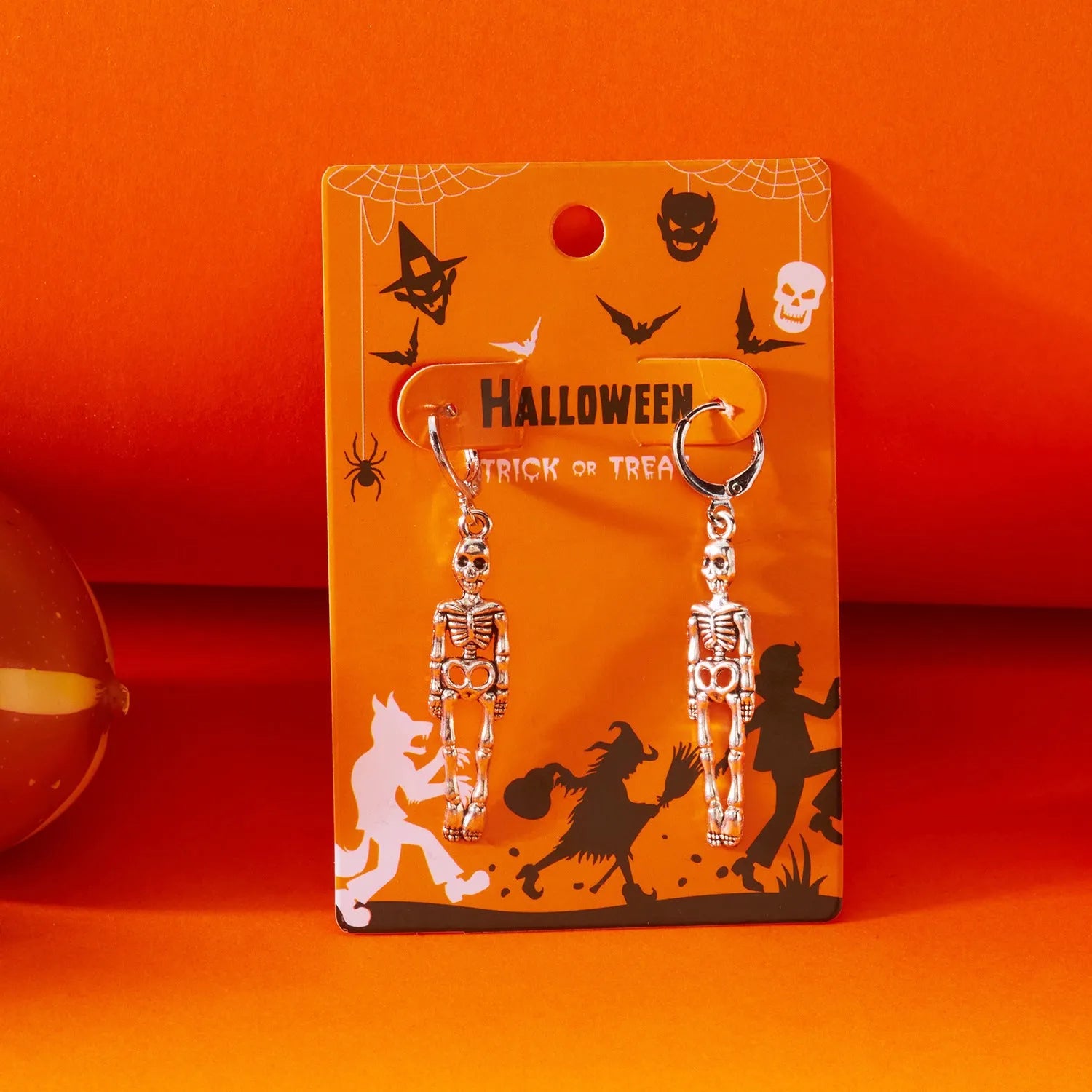 Creative long skull fringe earrings for women in gothic style with pumpkin skull pendant on alloy chain
