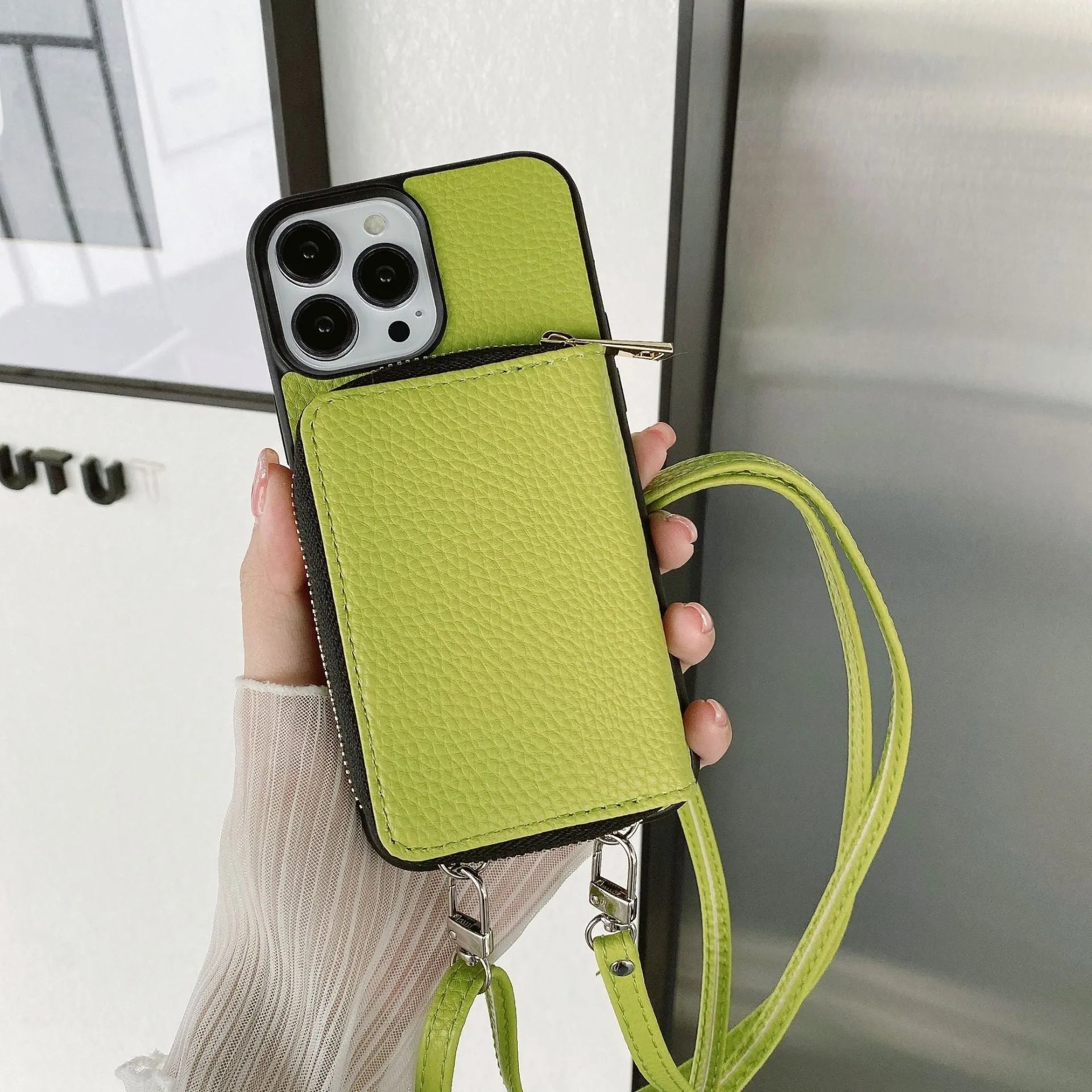 Litchi pattern phone case for iPhone in PC and leather, shown in blue colour.