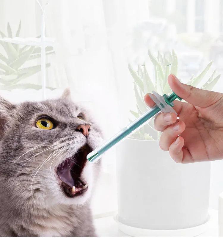 Two silicone pet pill shooters with soft tips for medication administration