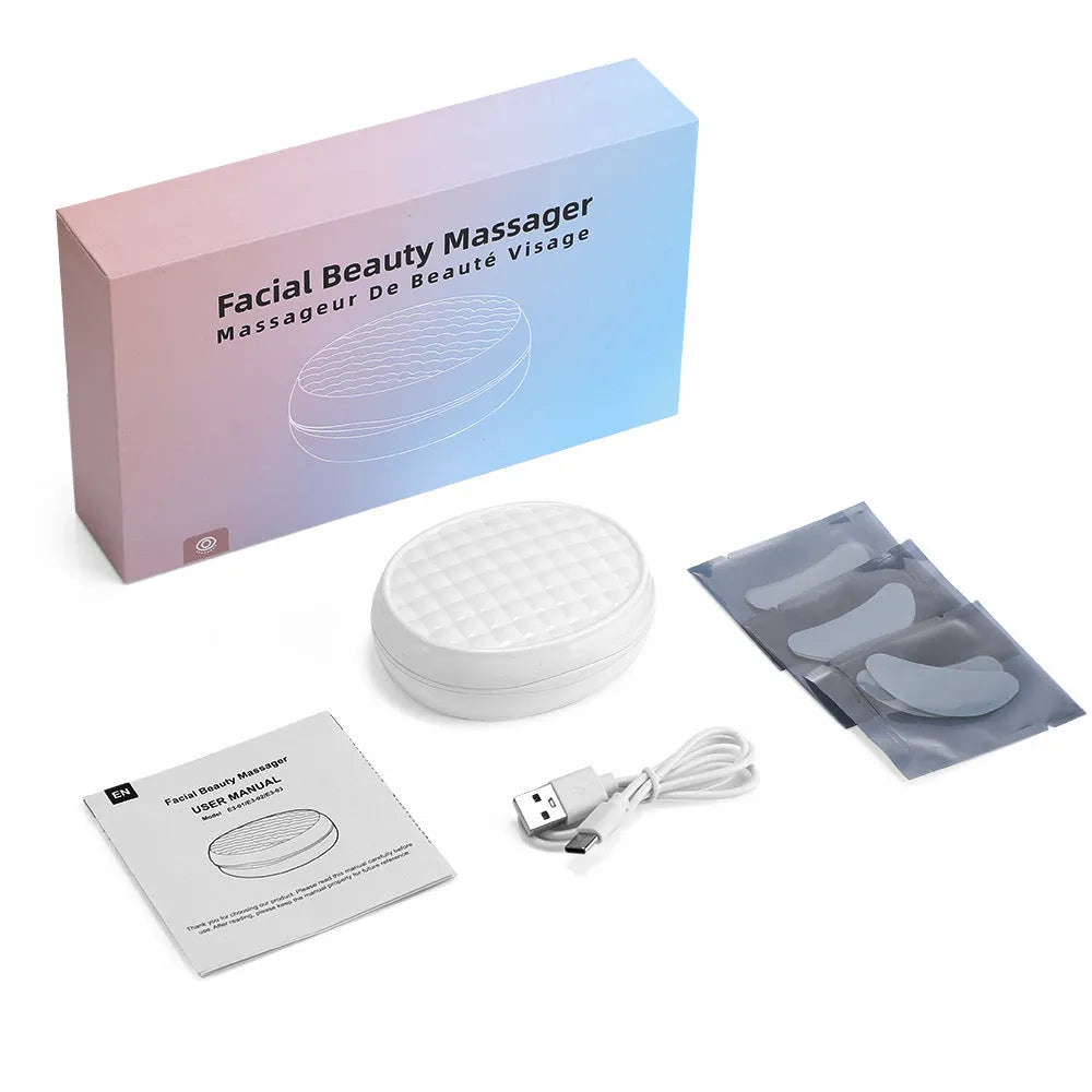 White wireless red light EMS eye and facial massager device for home beauty care