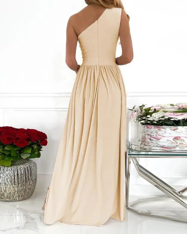 Women's apricot one shoulder sleeveless maxi dress with high split and cutout design.